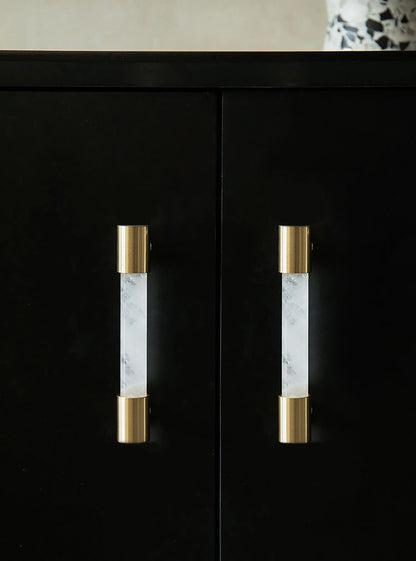 The Mantara C-0014-96 Haze Handle is a modern crystal and brass handle in white, ideal for cabinets and wardrobes.