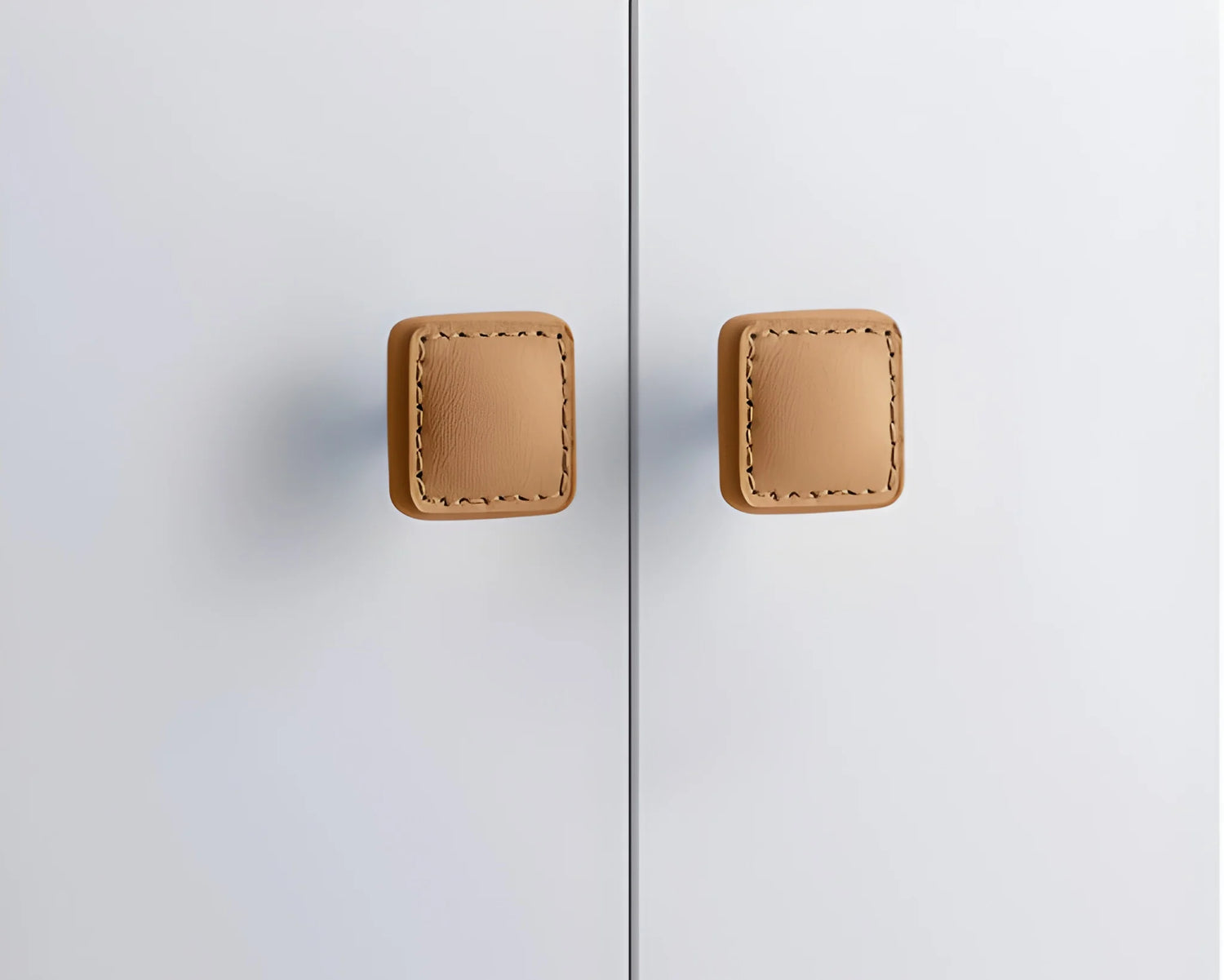 The Mantara L-0008 Sofia Square Knob is a modern leather knob in brown, perfect for cabinets and drawers.
