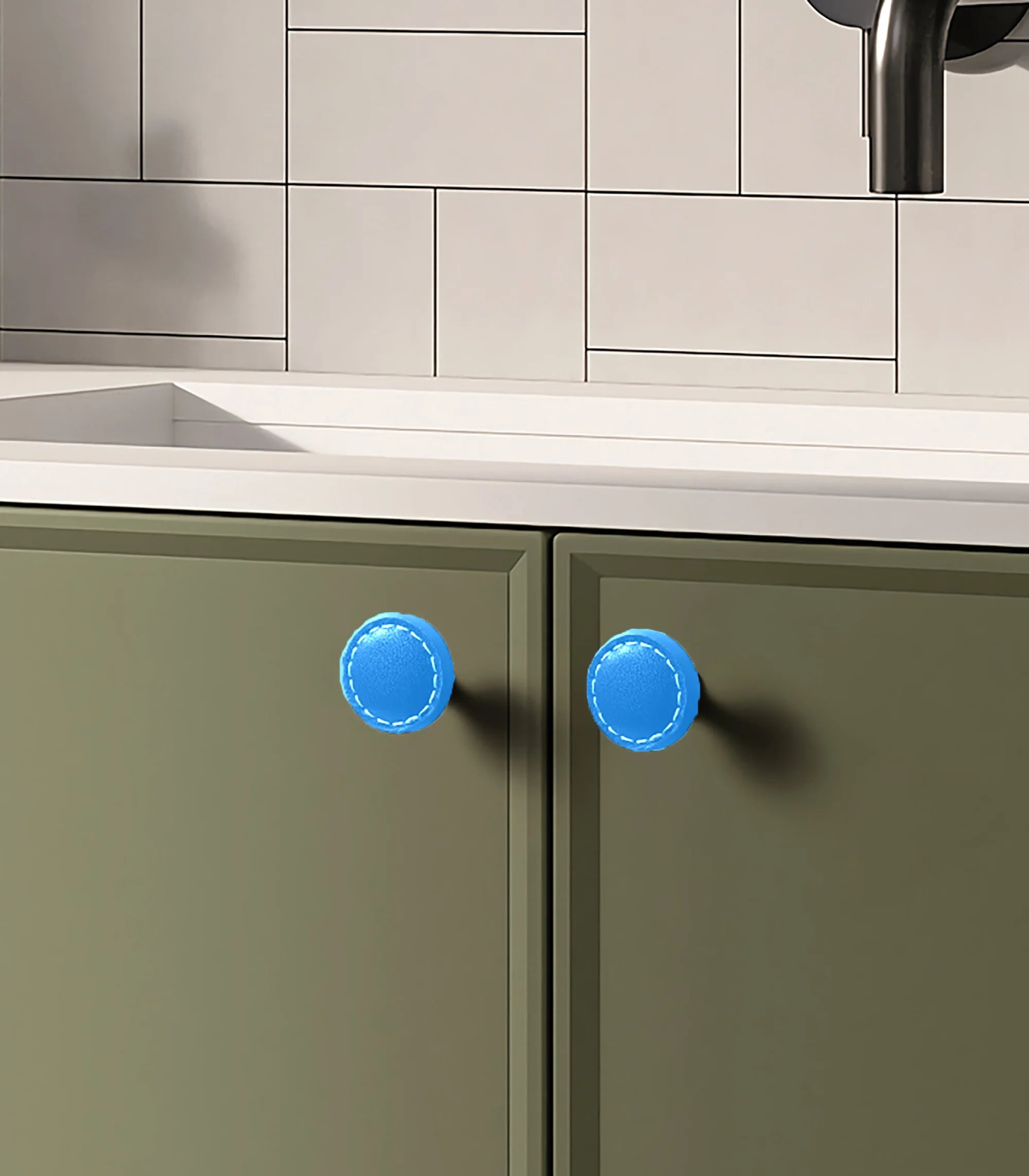 The Mantara L-0008 Sofia Round Knob is a modern leather knob in blue, ideal for cabinets and wardrobes.
