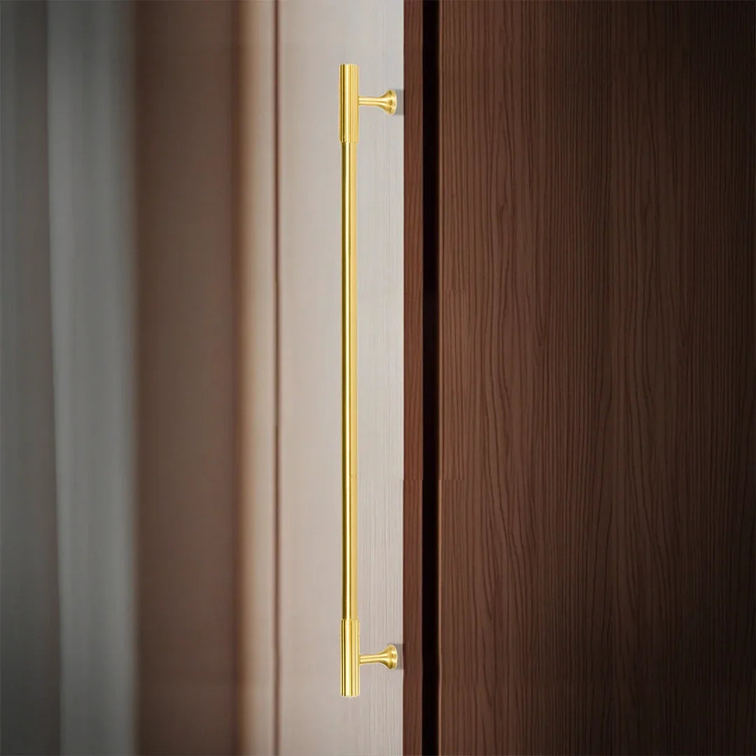 The Mantara B-0051 Oro handle is a modern brass Handle in polished Gold perfect for doors, drawers, and cabinets.