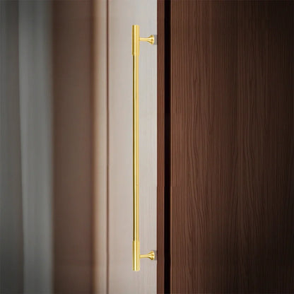 The Mantara B-0051 Oro handle is a modern brass Handle in polished Gold perfect for doors, drawers, and cabinets.