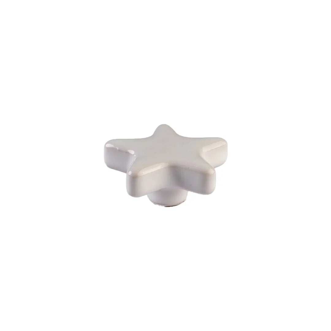 A small glossy white star-shaped cabinet knob centered on a plain white background.