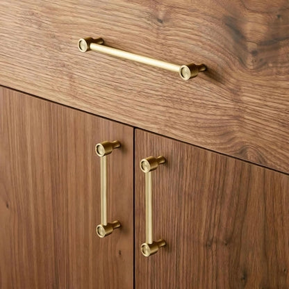 The Aurelia Handle by Mantara B-0108 is a brushed brass handle in gold, ideal for wardrobes, cabinets, and drawers.