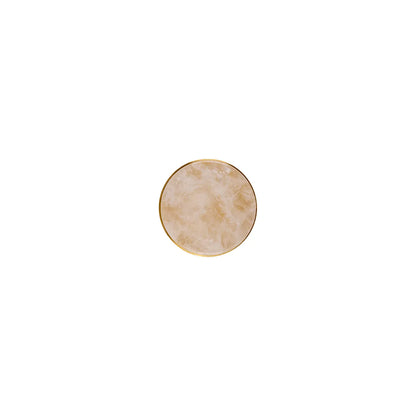 Brass gold with white crystal round knob shown top angle on white background