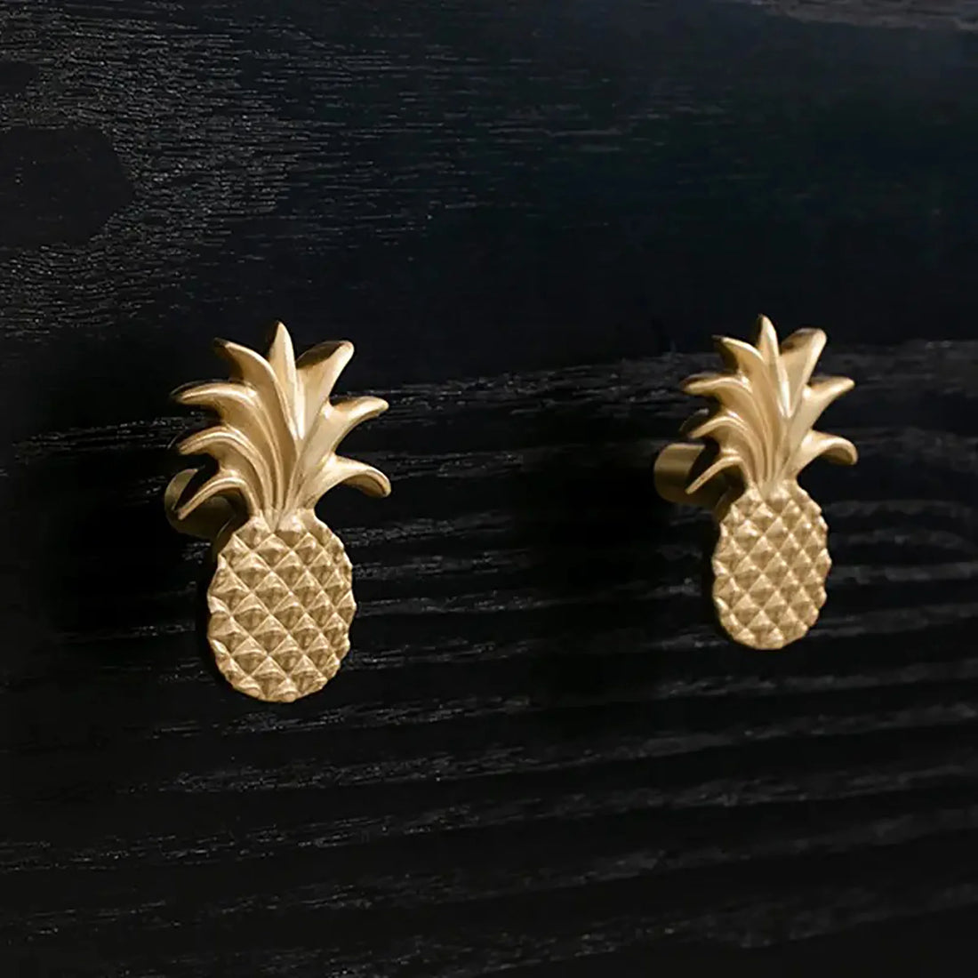 The Ananas Knob by Mantara B-0110 is a modern brushed brass knob in gold, ideal for dressers, cabinets, and kitchens.