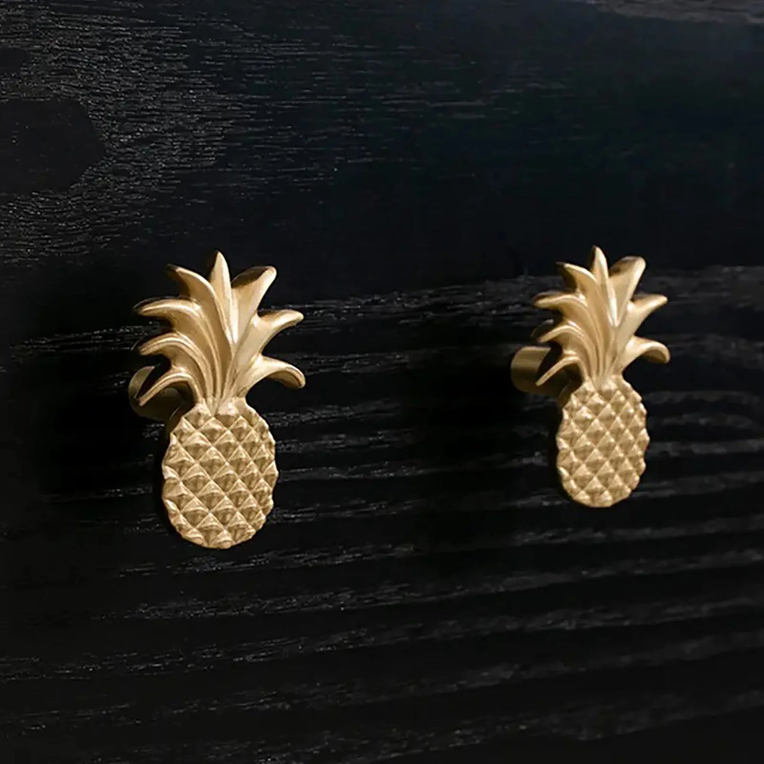 The Ananas Knob by Mantara B-0110 is a modern brushed brass knob in gold, ideal for dressers, cabinets, and kitchens.