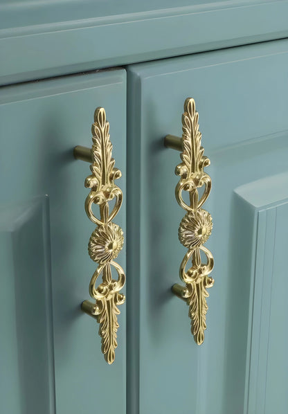 Mantara Daisy Handle B-0087 is a modern brass handle in gold, ideal for drawers, cabinets, wardrobes, and main doors.