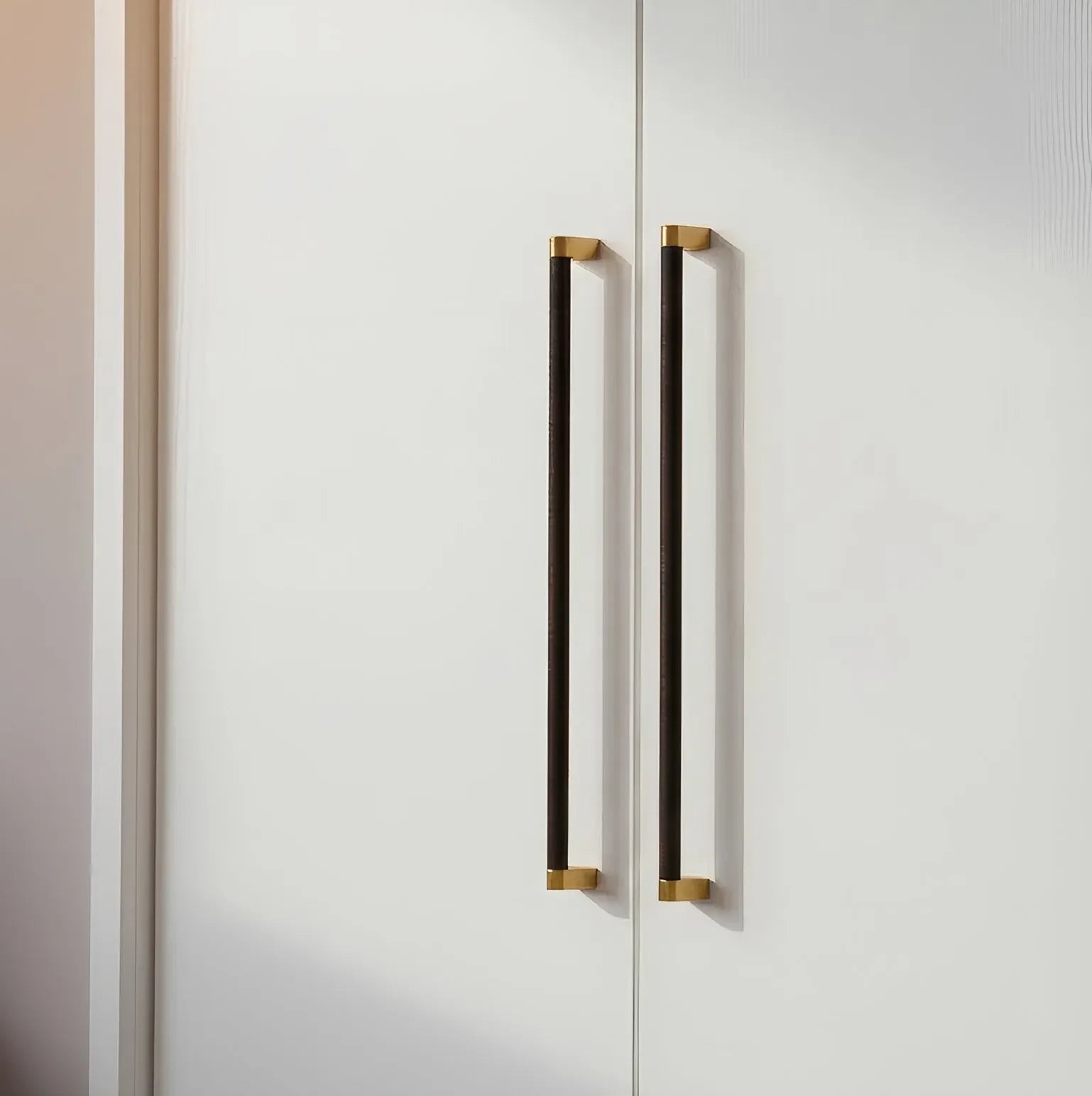 Mantara Julius Handle B-0065 is a modern brushed brass handle in black, ideal for doors, wardrobes, and drawers.