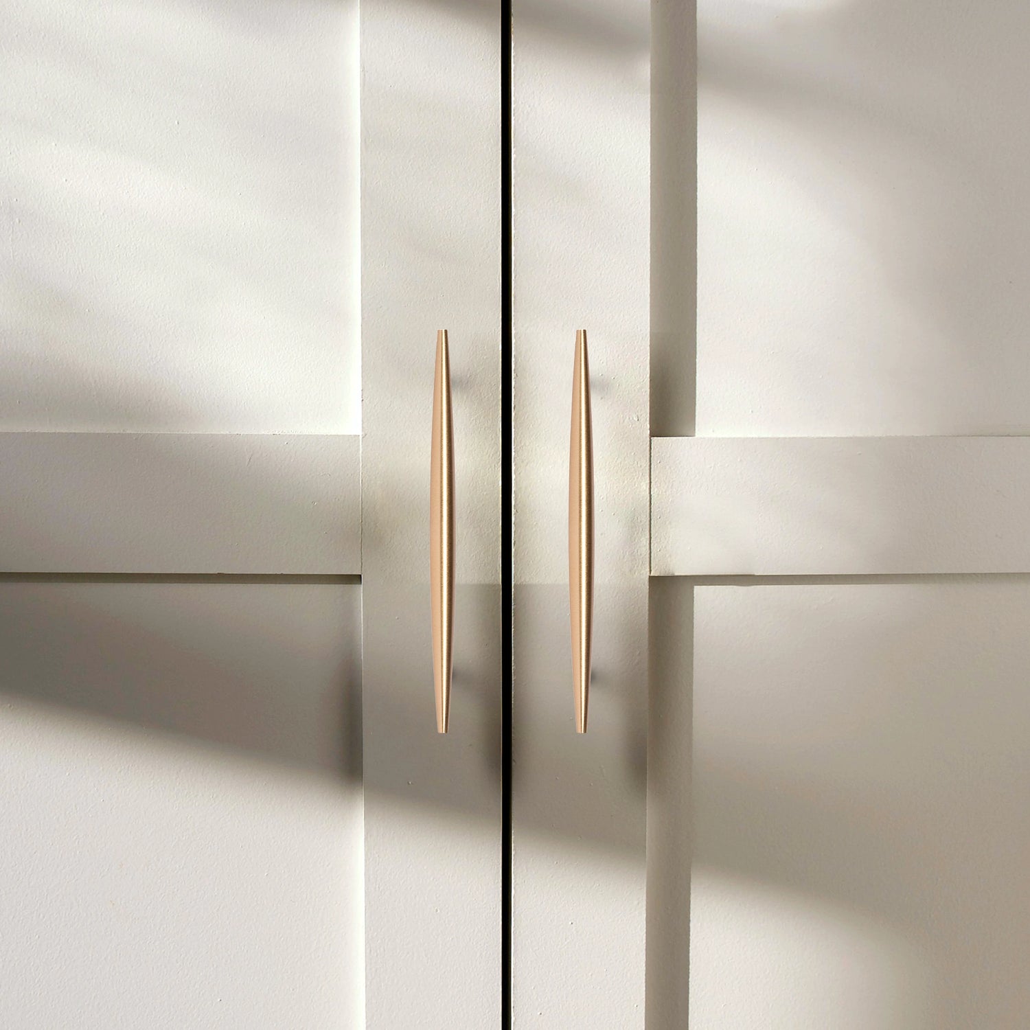 Mantara Gilded T Bar Handle B-0072 is a modern brass handle in brushed gold, ideal for wardrobes, doors, and kitchens.