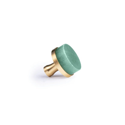 A single round cabinet knob with a textured mint green top and a brushed gold metal base, shown on a clean white background.
