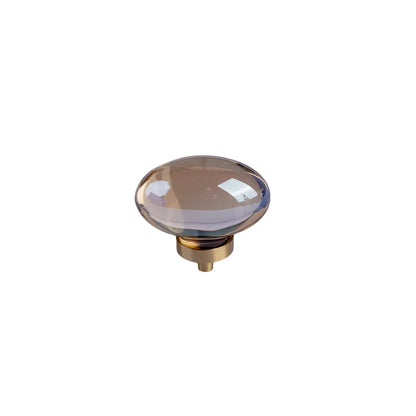 The Mantara C-0008 is a modern artificial crystal + brass knob in champange/brass, ideal for wardrobes and drawers.