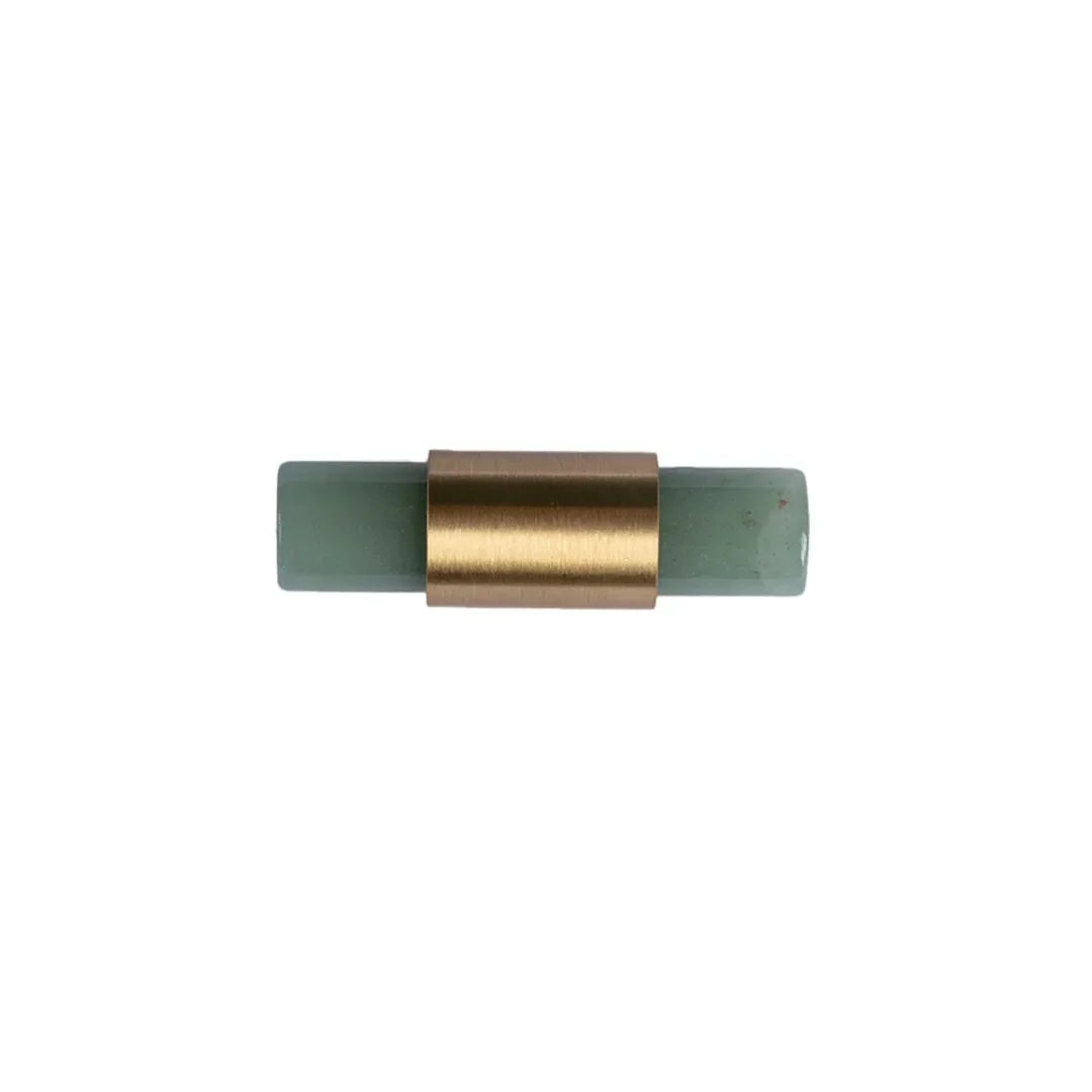 The Mantara C-0014-T Haze Handle is a modern crystal and brass T-handle in green, ideal for wardrobes and drawers.