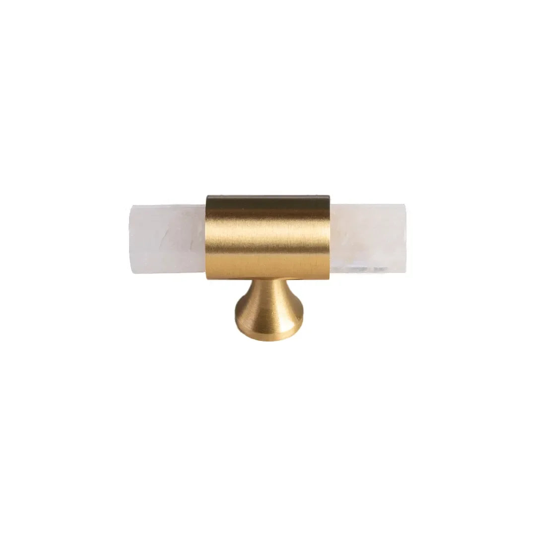 The Mantara C-0014-T Haze Handle is a modern crystal and brass T-handle in white, ideal for wardrobes and drawers.