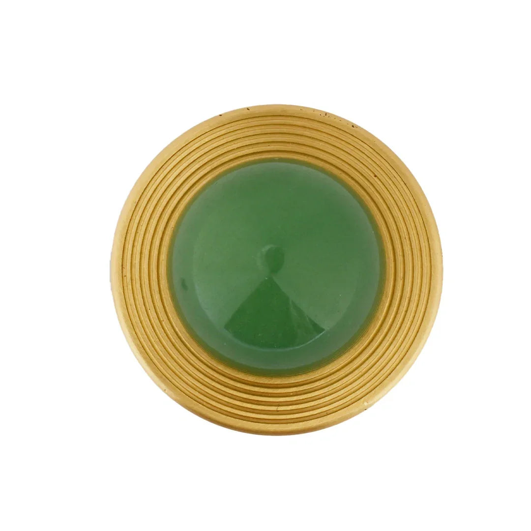 The Mantara C-0017 Opalia Knob is a modern crystal and brass knob green, ideal for drawers and cabinets.