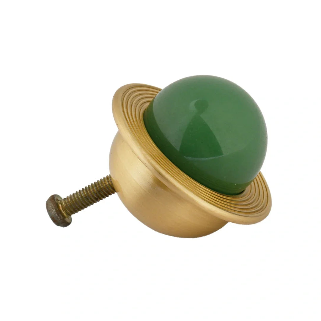 The Mantara C-0017 Opalia Knob is a modern crystal and brass knob green, ideal for drawers and cabinets.