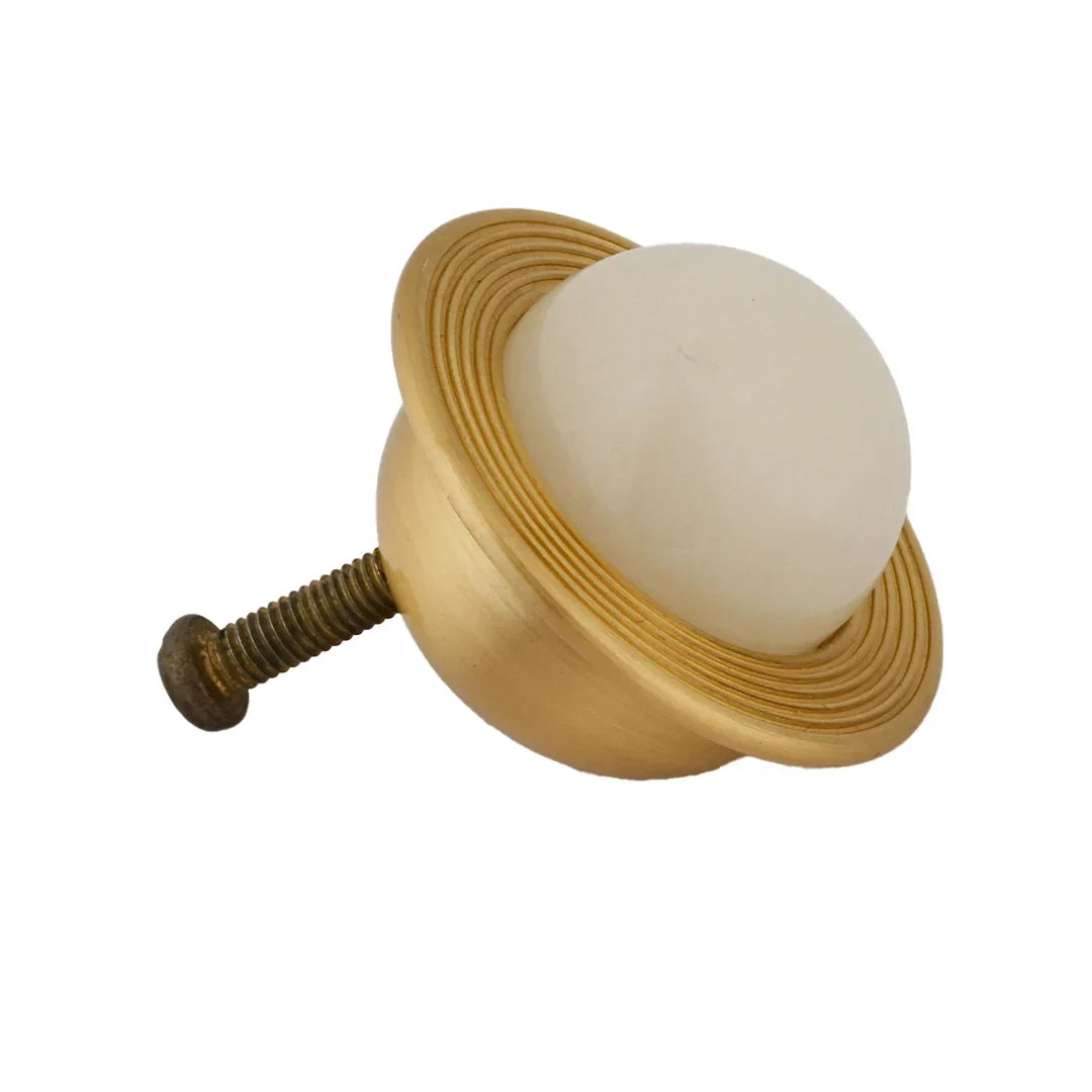 The Mantara C-0017 Opalia Knob is a modern crystal and brass knob white, ideal for drawers and cabinets.