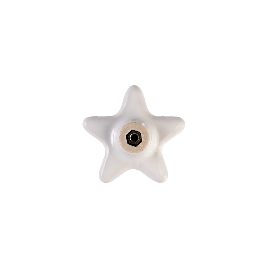 A single white ceramic star-shaped cabinet knob with a central hex socket, isolated on a solid white background.