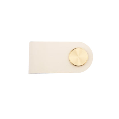 The Mantara L-0001 Maverick Pull Knob is a Nordic leather and brass knob in White, ideal for kitchens and furniture.
