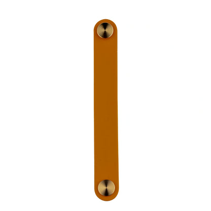 The Mantara L-0001-160 Maverick Handle is a Nordic leather and brass handle in brown ideal for kitchens and wardrobes.