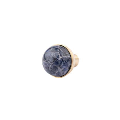 The Mantara C-0006 is a modern crystal + brass knob in black, ideal for drawers and cabinets.