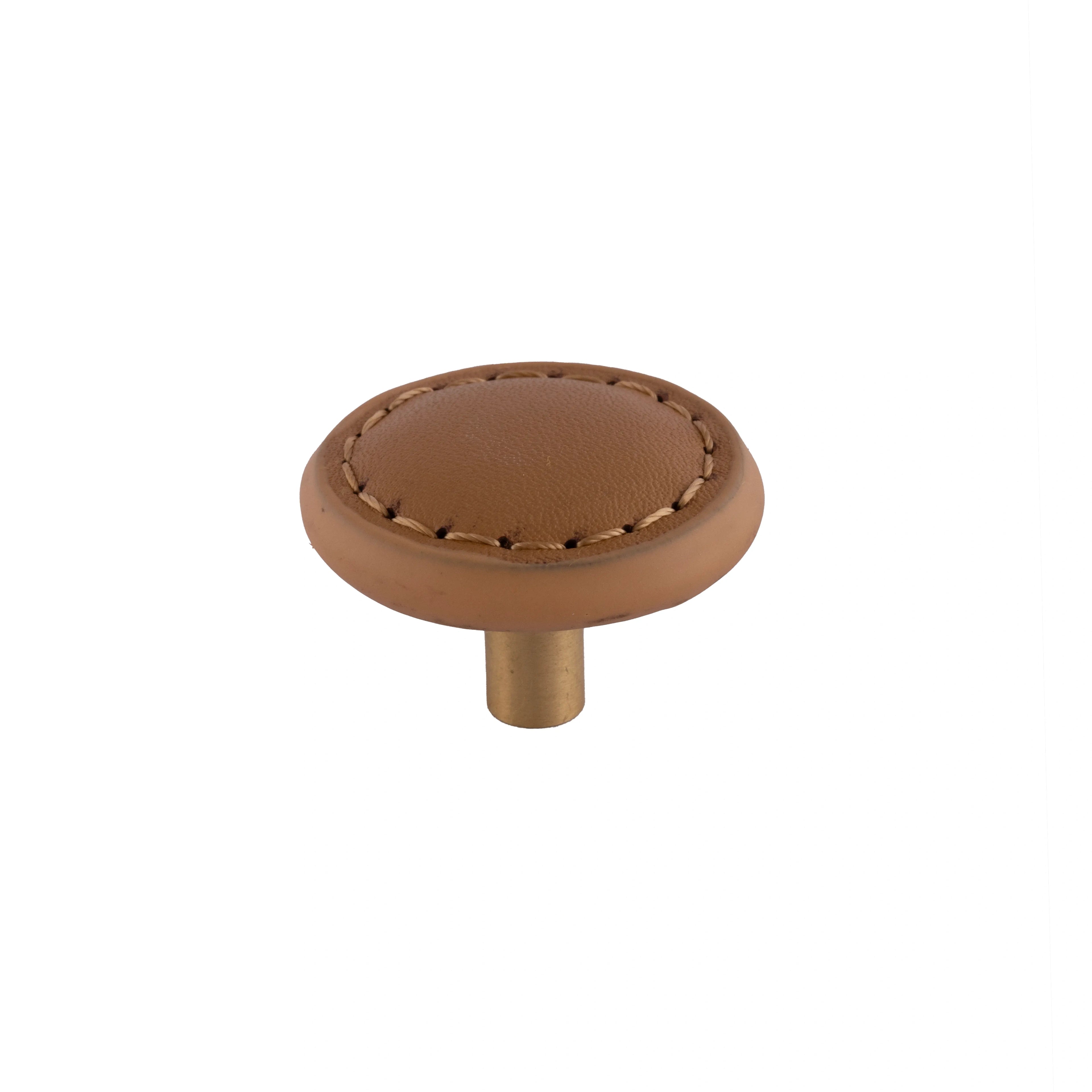 The Mantara L-0008 Sofia Round Knob is a modern leather knob in brown, ideal for cabinets and wardrobes.