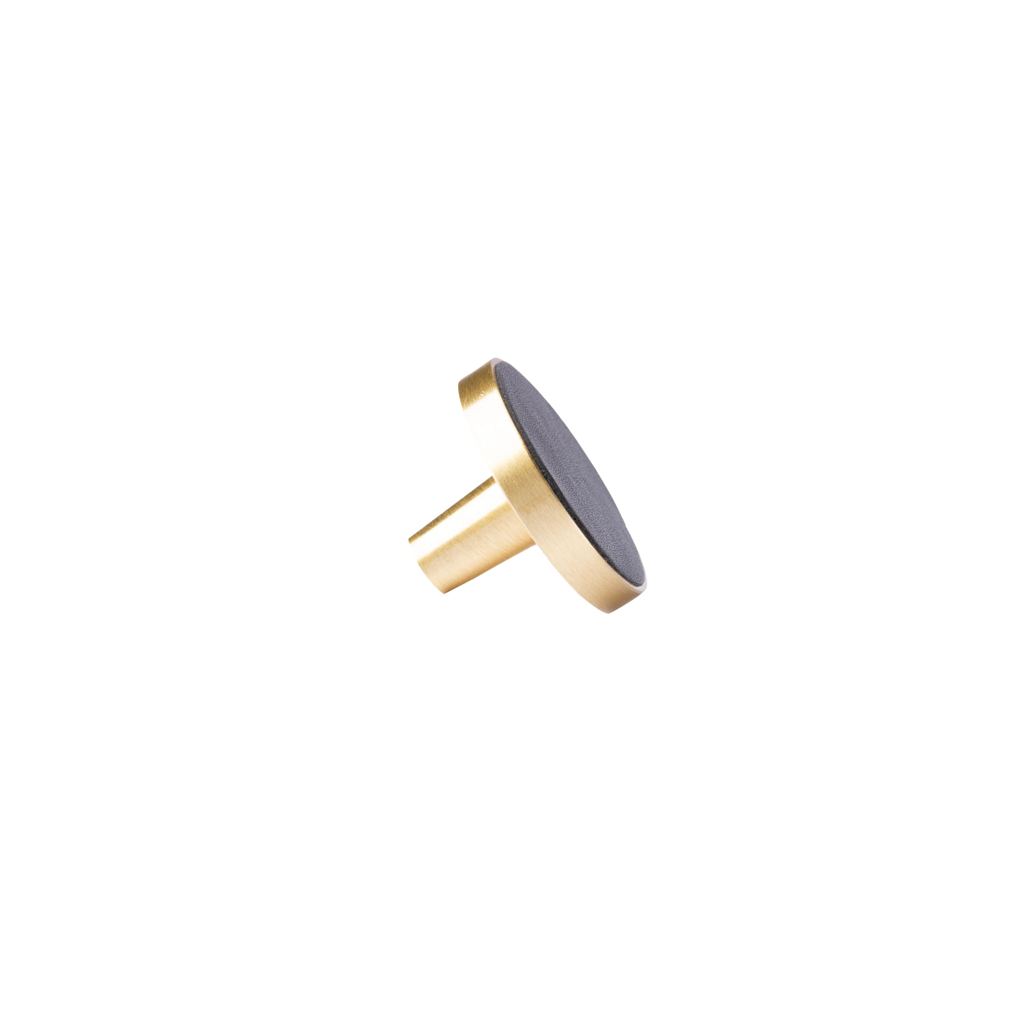 The Mantara L-0004 Obsidian Knob is a modern brass and leather knob in black, perfect for wardrobes, kitchens, and cabinets.
