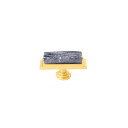The Mantara M-0010 Fuji Handle is a modern marble and brass handle in grey, ideal for kitchens, cabinets, and bathrooms.