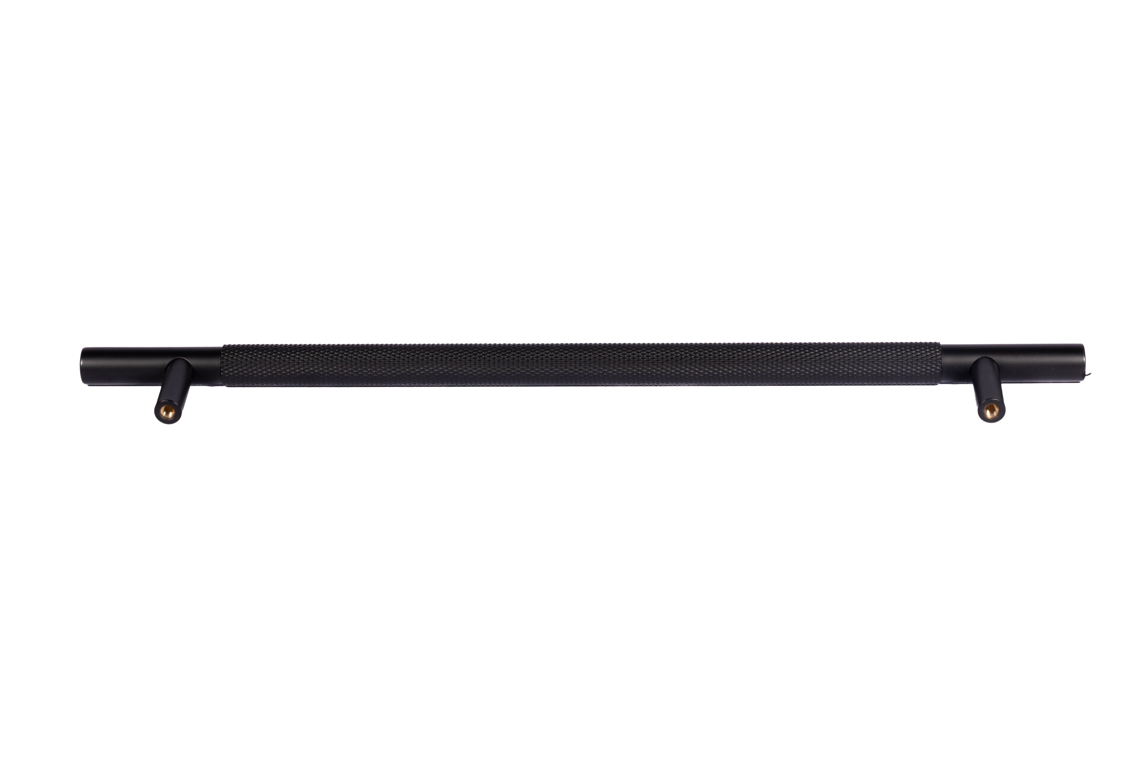 Mantara Enigma Handle B-0061 is a modern brushed brass handle in black, ideal for cupboards and drawers.