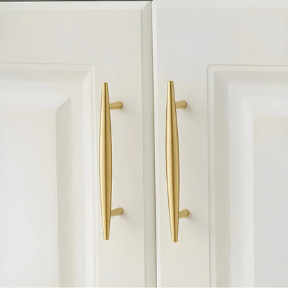 Mantara Gilded T Bar Handle B-0072 is a modern brass handle in brushed gold, ideal for wardrobes, doors, and kitchens.