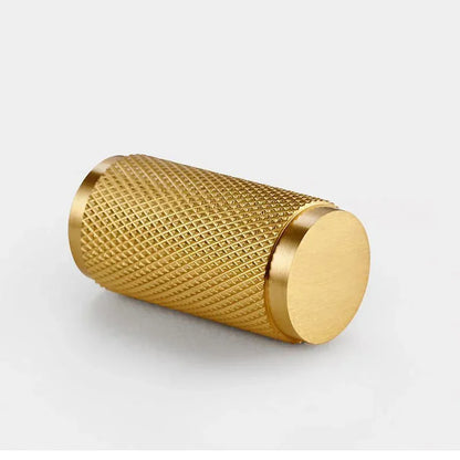 Mantara Pisa Knob B-0060 is a modern brushed brass handle in gold, ideal for wardrobes, cabinets, and main doors.