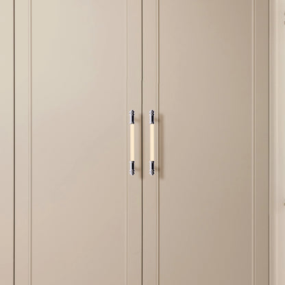 Beige wardrobe with two doors and sleek metallic handles, offering a soft, contemporary look by Mantara.