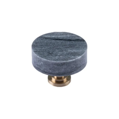 The Mantara M-0001 Theo Knob is a modern marble and brass knob in Grey, ideal for doors, drawers, and cabinets.