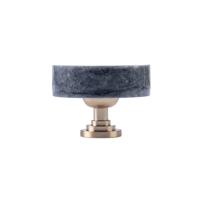 The Mantara M-0001 Theo Knob is a modern marble and brass knob in Grey, ideal for doors, drawers, and cabinets.
