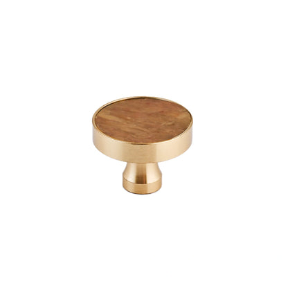 The Mantara M-0004 Carrara Knob is a modern stone and brass knob in  Red jade , ideal for drawers and cabinets.