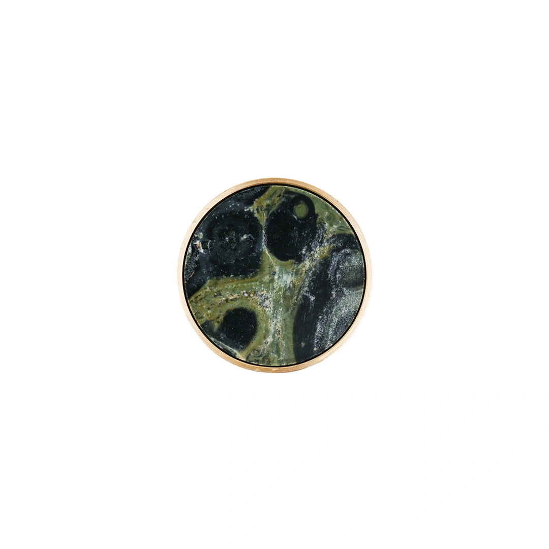 The Mantara M-0004 Carrara Knob is a modern stone and brass knob in Peacock stone, ideal for drawers and cabinets.