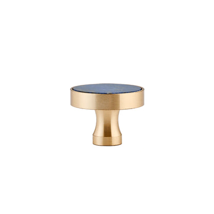 The Mantara M-0004 Carrara Knob is a modern stone and brass knob in  Blue , ideal for drawers and cabinets.