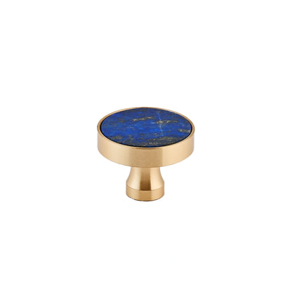 The Mantara M-0004 Carrara Knob is a modern stone and brass knob in  Blue , ideal for drawers and cabinets.
