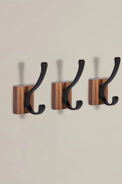 Mantara Thorne Hook W-0032 is a modern space aluminum and walnut hook in black and  ideal for kitchen and dresser drawers.