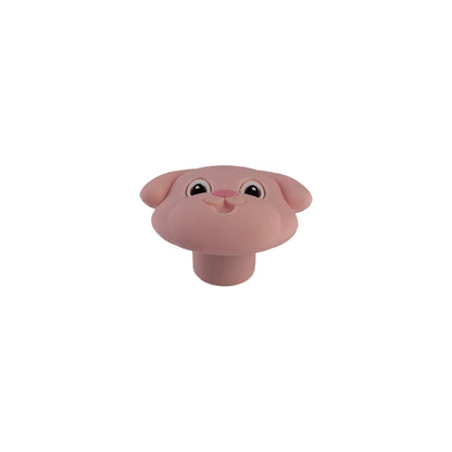A pink silicon  cabinet knob shaped like a cute cartoon dog head, shown against a plain white background.