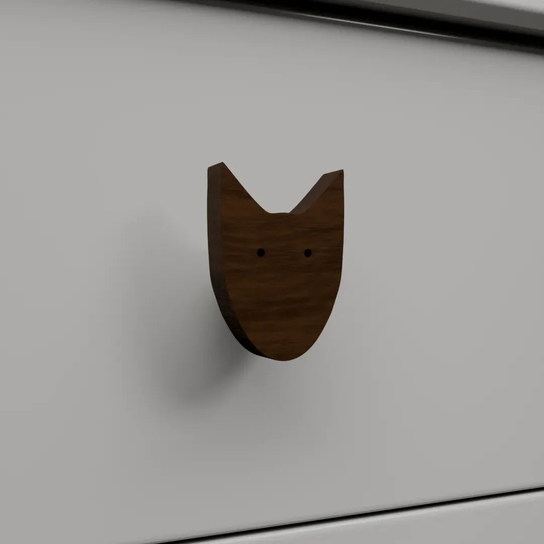 Mantara Dog Knob  W-0024 is a modern walnut  wooden knob/hook, ideal for kids’ rooms, drawers, and wardrobes.
