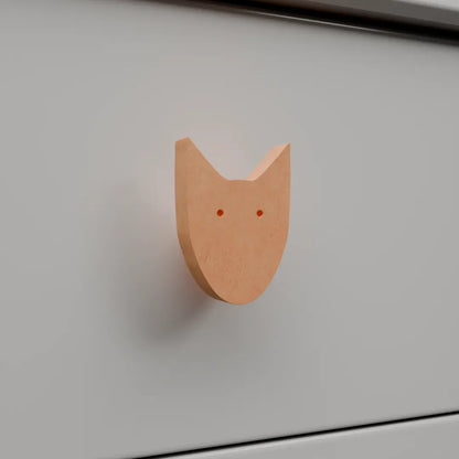 Mantara Dog Knob  W-0024 is a modern beige  wooden knob/hook, ideal for kids’ rooms, drawers, and wardrobes.