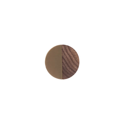 Brass and wooden round knob  on a white background