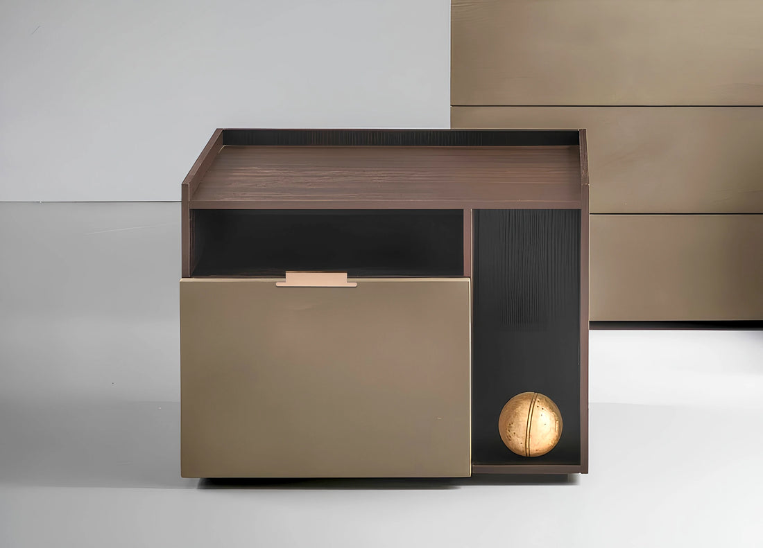 Modern side table with a metallic finish, wooden accents, and a sleek handle, set against a neutral background—by Mantara.