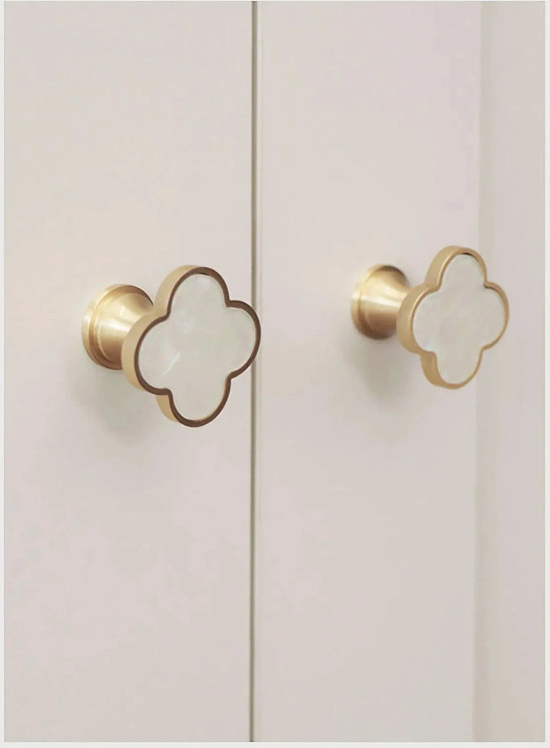 Acrylic and brass round drawer knob in shell white finish by Mantara for cabinets, wardrobes and kitchen drawers. Alhambra knob A-0006