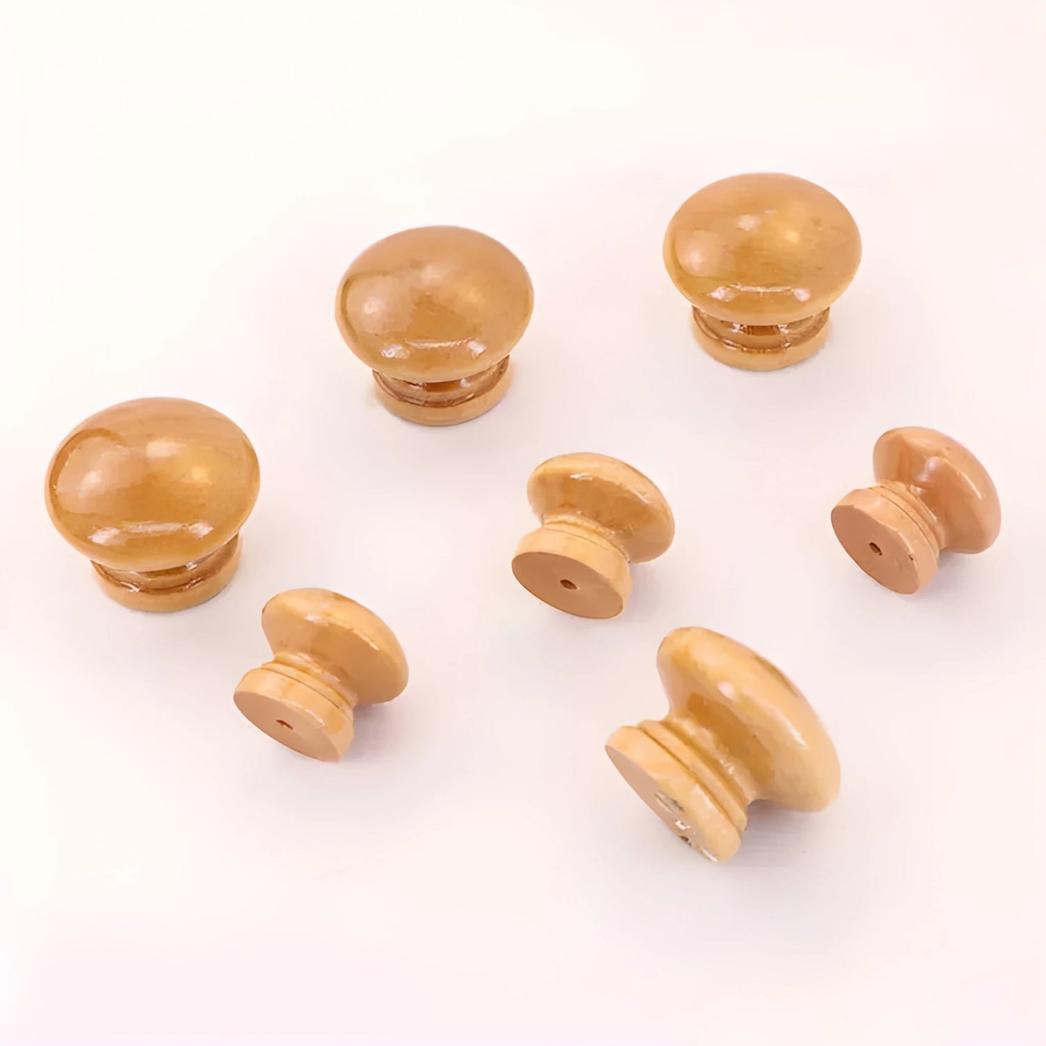 Cabinet knob made of wood in beech finish by Mantara, model W-0044 - modern wood knob for furniture.