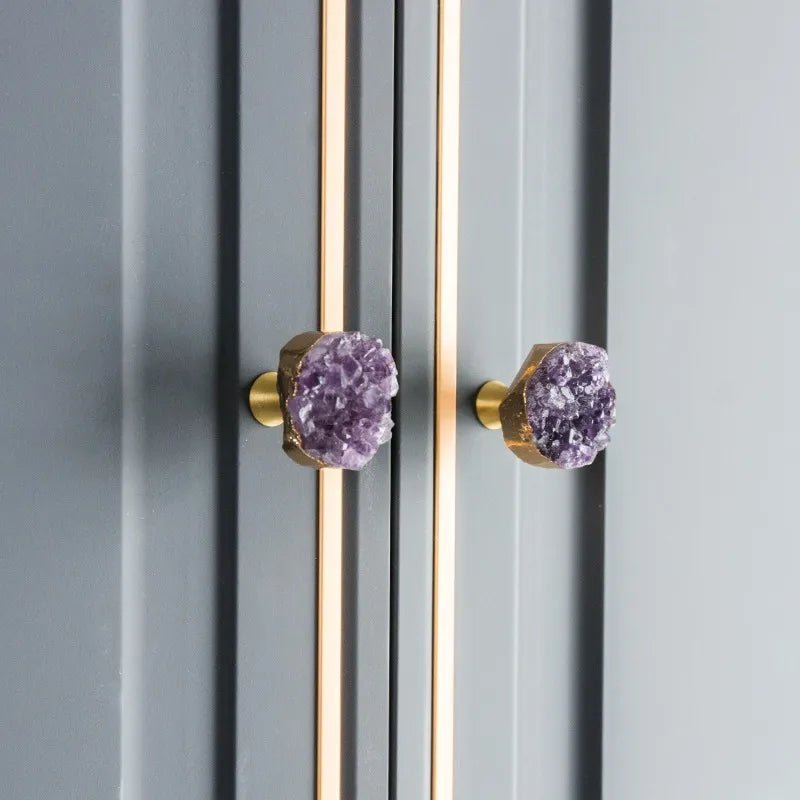 The Mantara C-0026 Amethyst Knob is a modern crystal and brass knob in purple, ideal for drawers, cabinets, and kitchens.