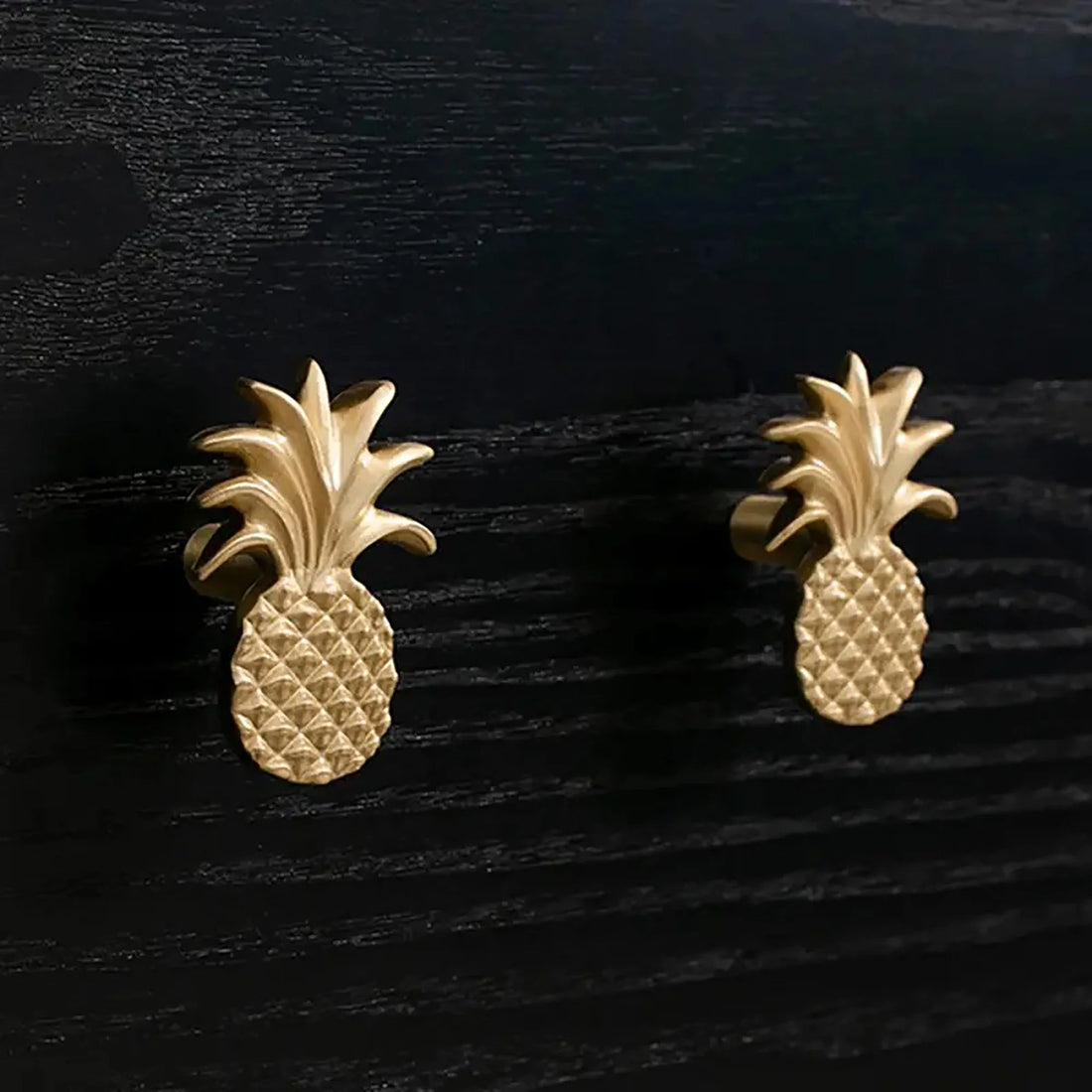 The Ananas Knob by Mantara B-0110 is a modern brushed brass knob in gold, ideal for dressers, cabinets, and kitchens.
