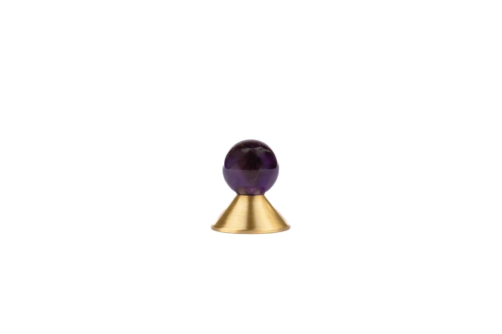 The Mantara C-0021 Astro Knob is a modern crystal and brass knob in purple, perfect for drawers and cabinets.