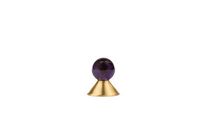 The Mantara C-0021 Astro Knob is a modern crystal and brass knob in purple, perfect for drawers and cabinets.