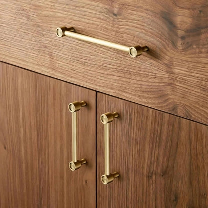 The Aurelia Handle by Mantara B-0108 is a brushed brass handle in gold, ideal for wardrobes, cabinets, and drawers.